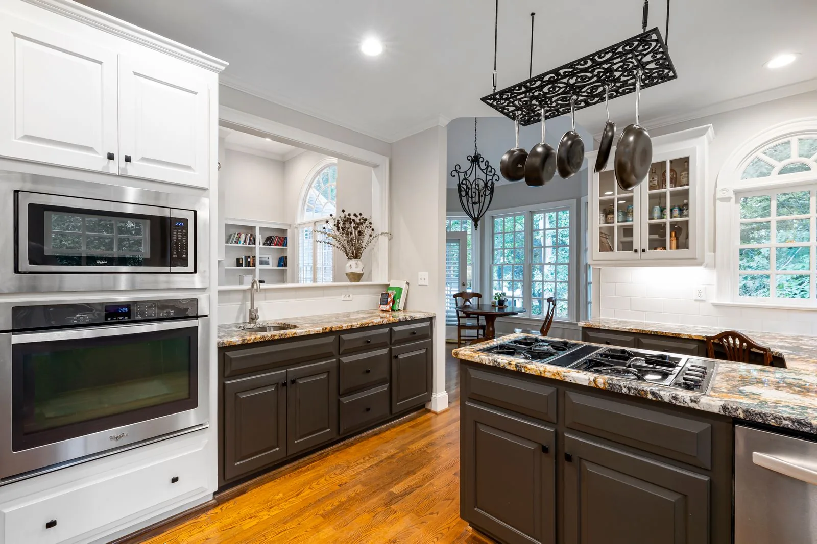 Pots and pans arranged above a kitchen work area